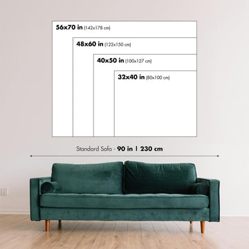 Different sizes of wall art, on a wall, with a sofa for scale. Used to show relative sizes of products available.