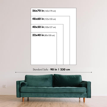 Different sizes of wall art, on a wall, with a sofa for scale. Used to show relative sizes of products available.