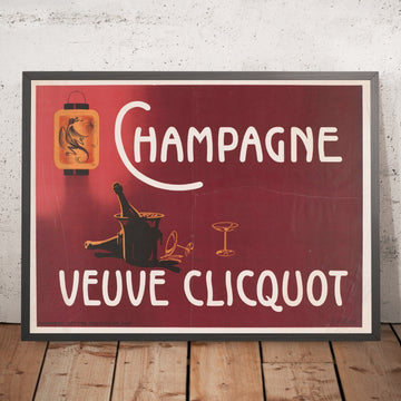 A framed image of Veuve Clicquot Vintage Champagne Poster by Arnold van Roessel, 1900