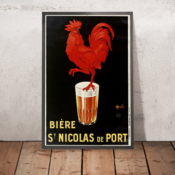 A framed image of St. Nicolas de Port Vintage Beer Poster by Marcellin Auzolle, 1933