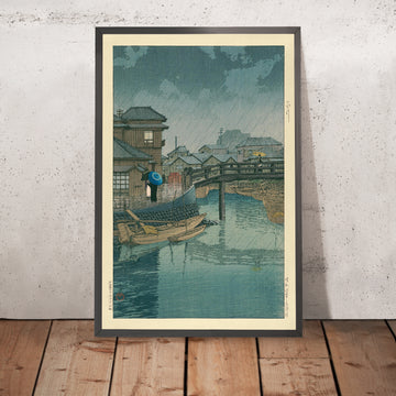 Une image encadrée de la saison des pluies à Ryoshimachi, Shinagawa par Hasui Kawase, 1935